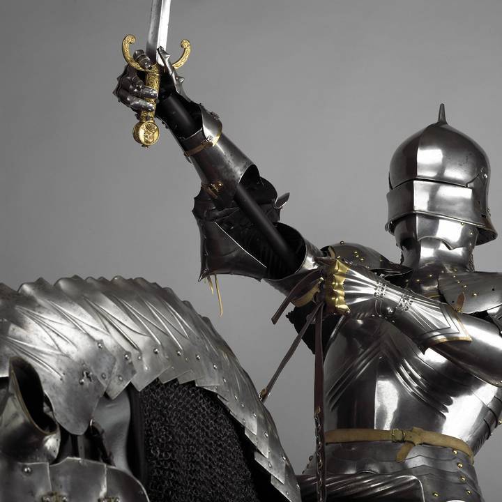 woman looking at armour