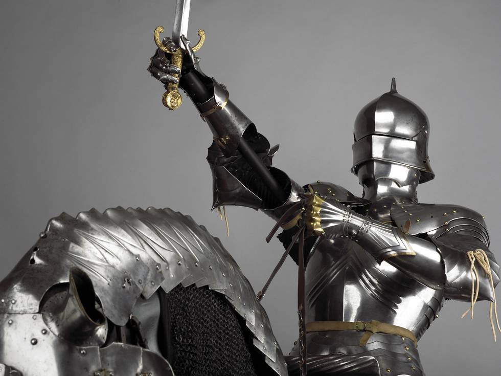 Close up detail photograph of a medieval knight on an armoured horse