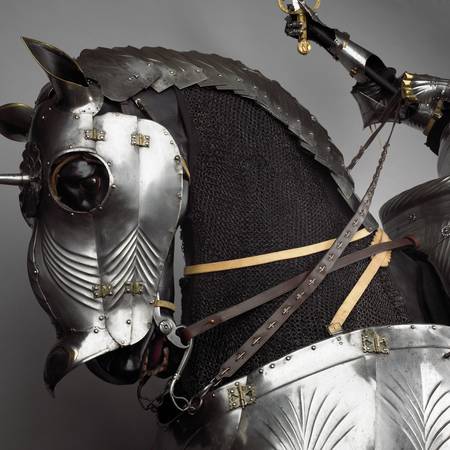 Detail photograph of a medieval knight on an armoured horse