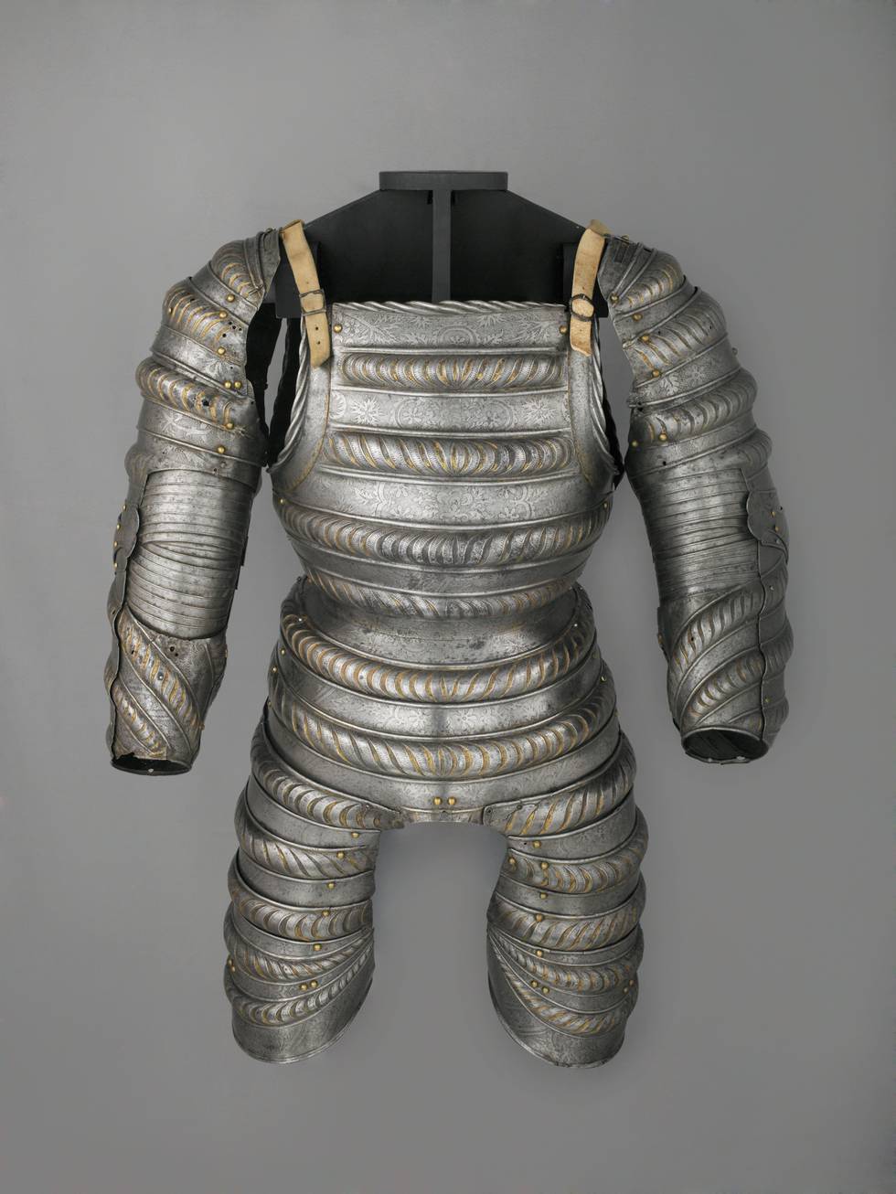 Photograph of the arms and body of a detailed armour