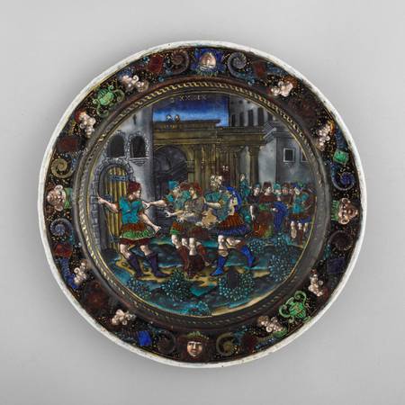 An image of an enamel plate decorated with a scene of Joseph being taken to prison