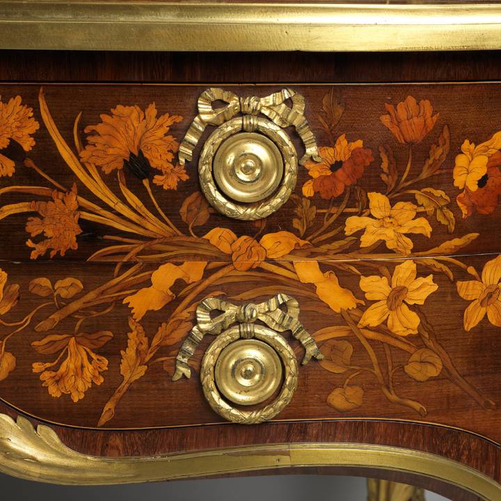A detail of floral marquetry on a roll-top desk