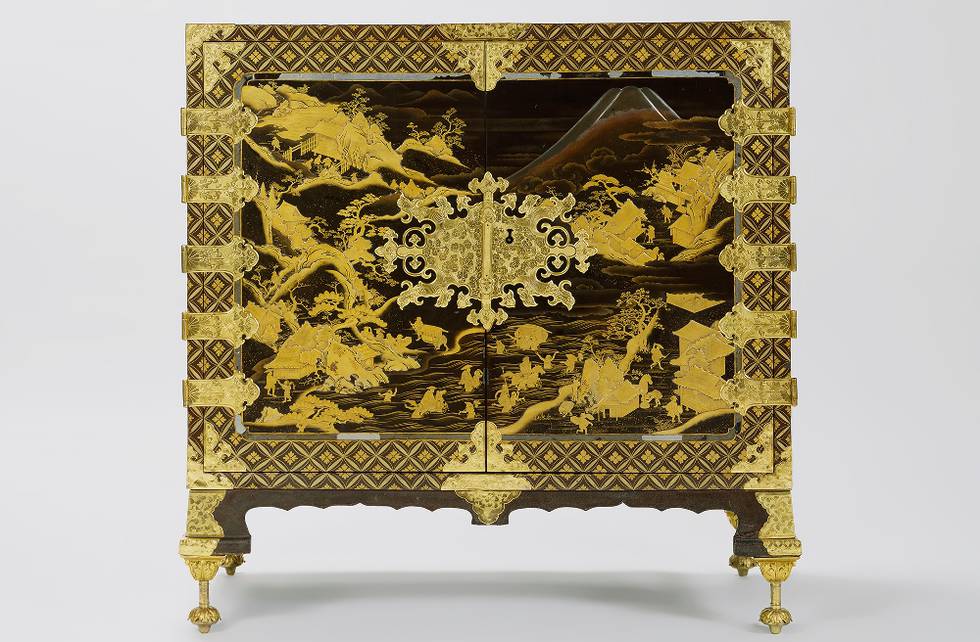 Wood cabinet with decorative mountains, buildings and rock on doors