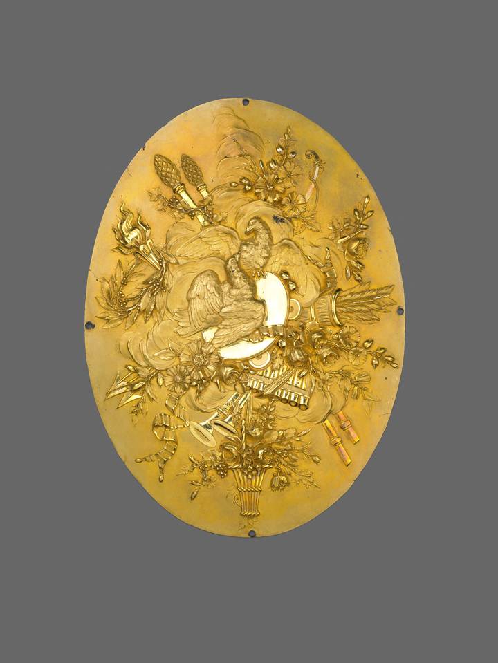 Gilt-bronze plaque (F295).