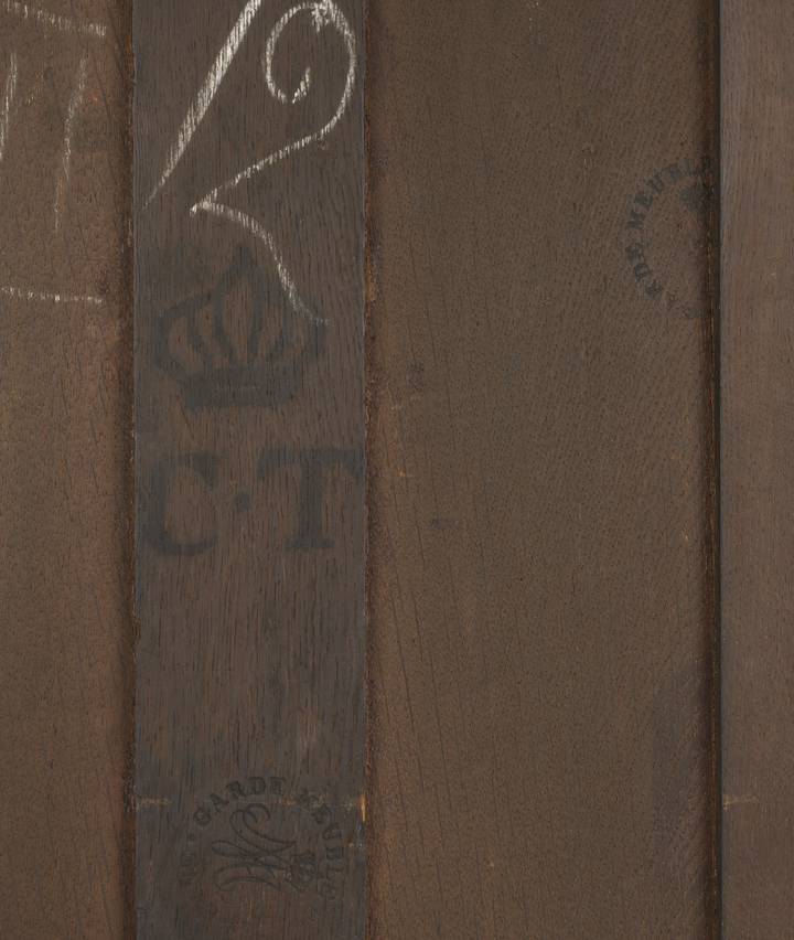 Detail of Petit Trianon inventory mark, 'CT', and stamp of the Garde-Meuble de la Reine, on the back of the desk. Fall-front desk (F302).