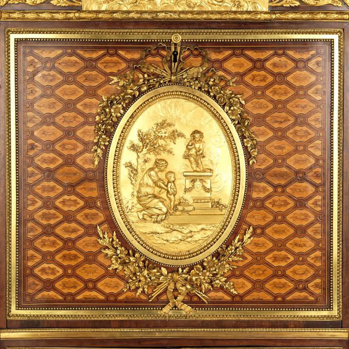 A detail of marquetry on a fall-front desk