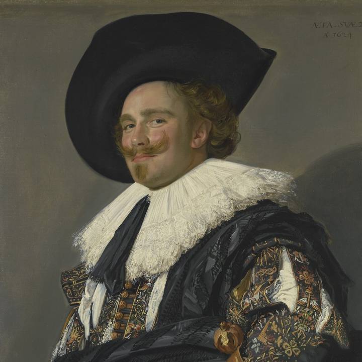 A portrait of a man wearing a hat