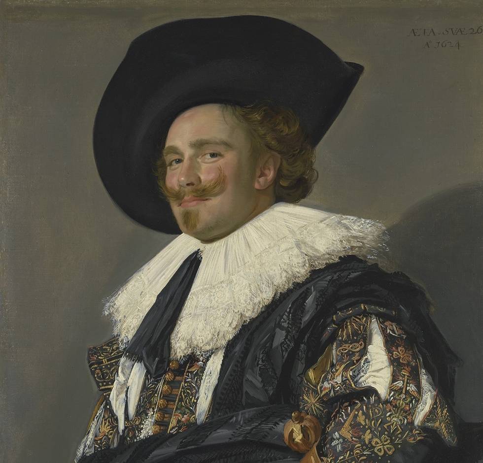 A portrait of a man wearing a hat