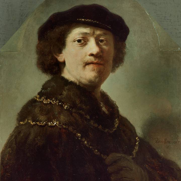 A portrait of a man wearing a hat