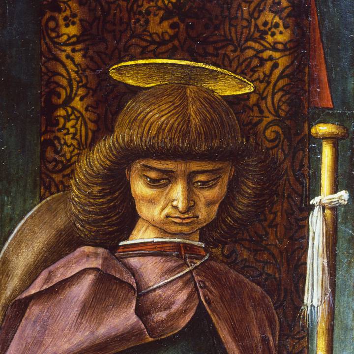 A detail of a painting of a man with a halo
