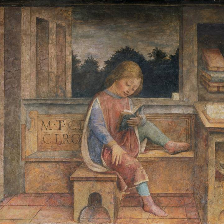 Fifteenth-century painting of a young boy sat on a bench reading book
