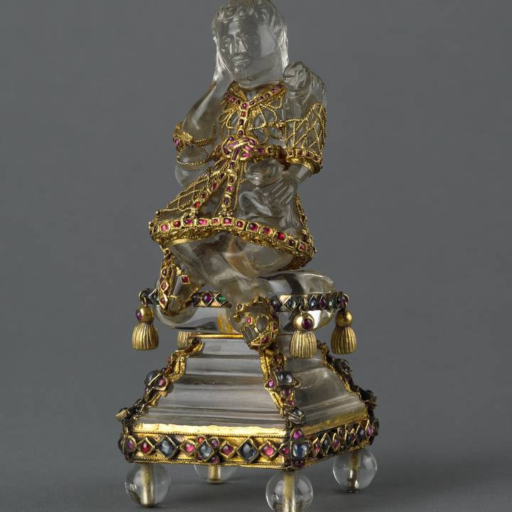 Three-quarter length of statue of christ as a Shepard, decorated with gold and jewels