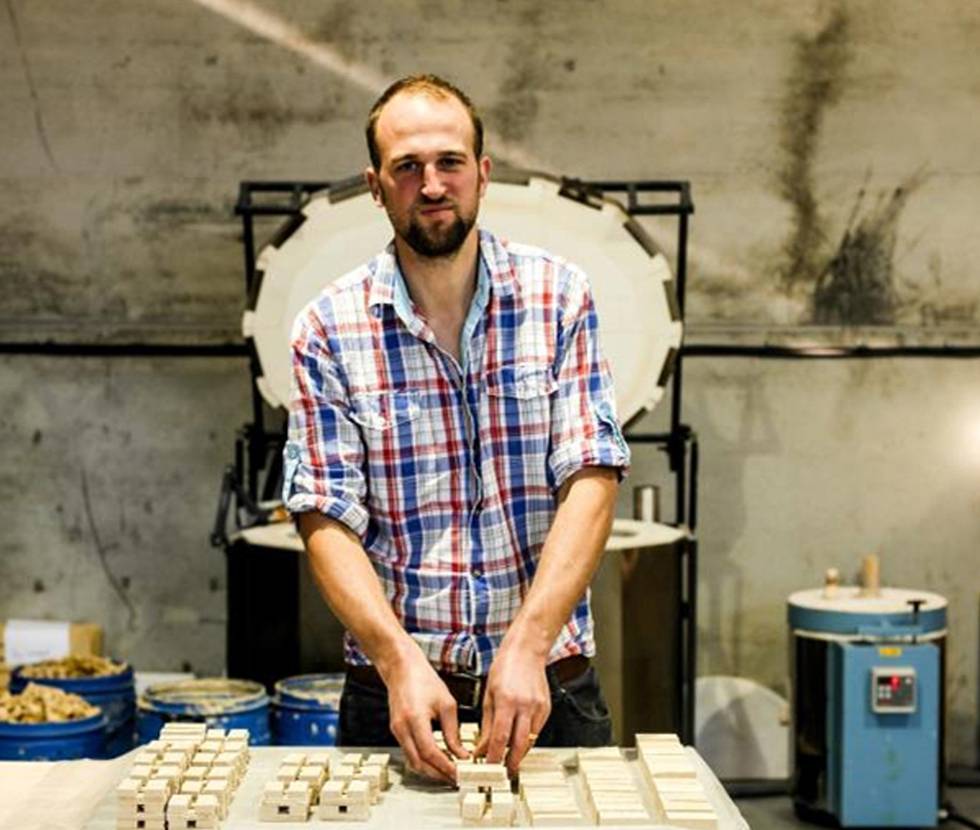 An image of a man in an artist's studio